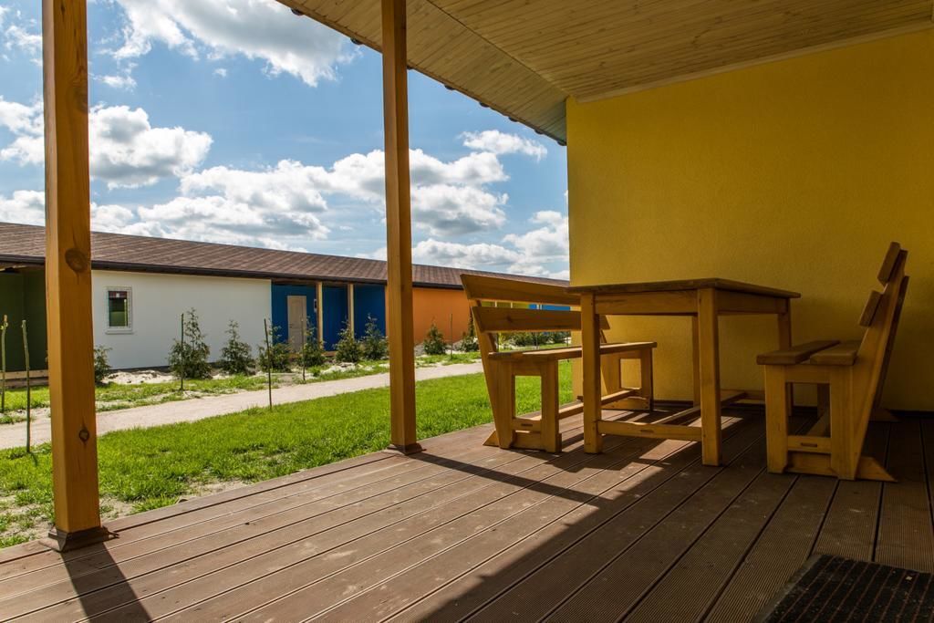Дома для отпуска AVENTURIER CLUB houses in a line Rozhny-6